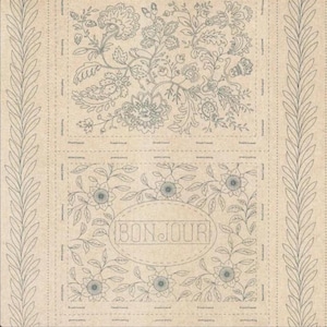 May include: A light tan fabric panel featuring two distinct rectangular embroidery patterns outlined with dashed lines. The top section displays intricate floral motifs, while the bottom section features flowers surrounding the word BONJOUR.
