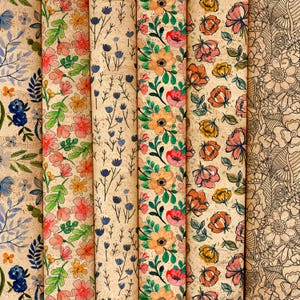 Può includere: Sei rotoli verticali di tessuto di sughero con vari motivi floreali. I disegni includono fiori di campo blu, fiori rosa e arancioni con foglie verdi, piccoli boccioli blu, grandi fiori gialli e rosa e un disegno floreale a linee in bianco e nero.