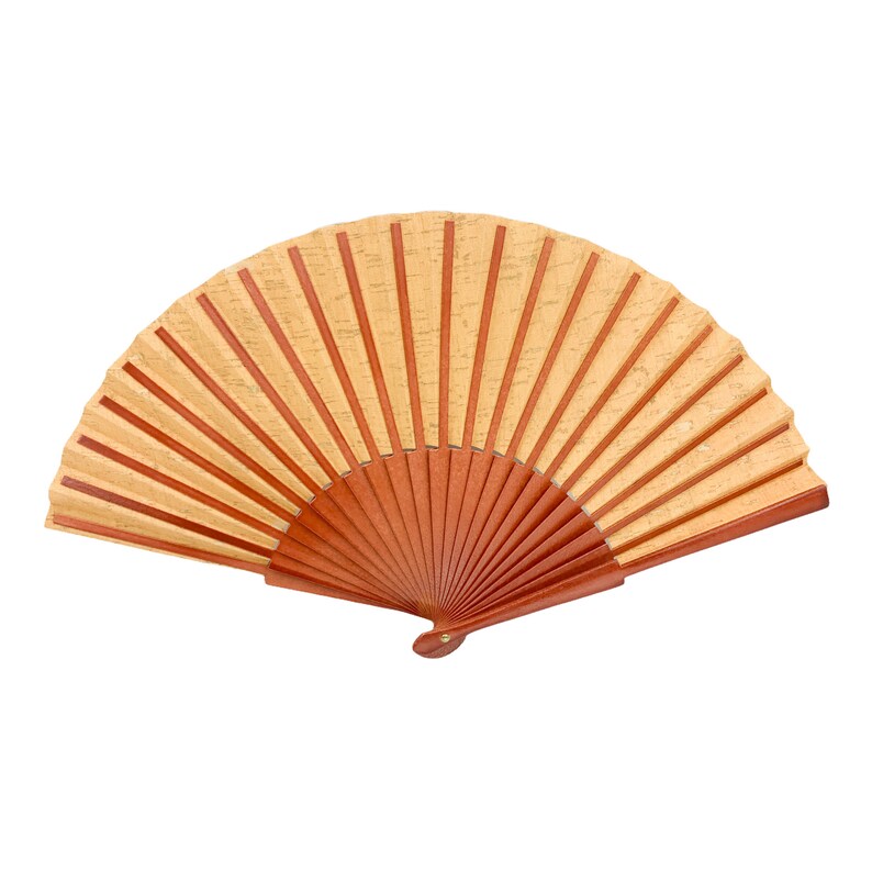 May include: A brown and beige hand fan with a wooden handle. The fan is closed and has a decorative pattern.