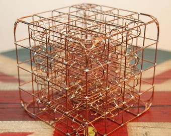 Another caged ball; Rolling Ball Sculpture: Kinetic Marble Machine