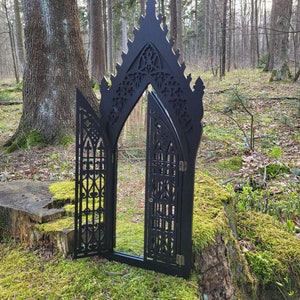 Goth mirror with ornamented door