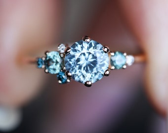 Teal sapphire ring, montana sapphire ring, round sapphire engagement ring.