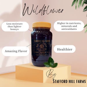 May include: A glass jar of Stafford Hill Farms Wildflower 100% Pure Honey. The honey is dark amber in color and the jar has a gold lid. The label is black with gold lettering and a small image of a wildflower. The text on the label reads "Stafford Hill Farms Wildflower 100% Pure Honey Premium Unpasteurized Raw".