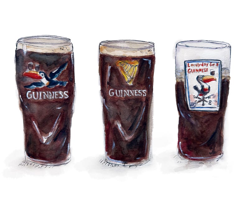 May include: Three glasses of Guinness beer, each with a different design. The first glass features a toucan with the words "Guinness" below. The second glass has a harp design with the word "Guinness" below. The third glass has a toucan with the words "Lovely day for a Guinness" below.