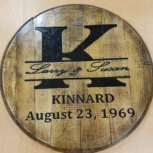 Hand engraved used bourbon barrel heads