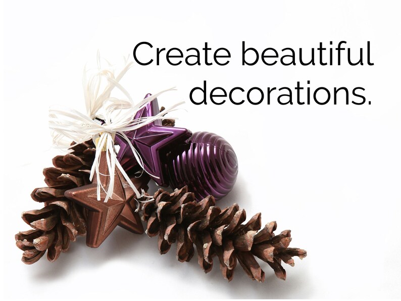 May include: Create beautiful decorations. A close-up of a brown pine cone, a purple star ornament, a brown star ornament, and a purple round ornament.