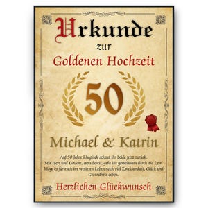 May include: A framed certificate with German text celebrating a Golden Wedding Anniversary. The design features ornate fonts, a gold laurel wreath around the number 50, and a red wax seal. The names Michael & Katrin are also displayed.