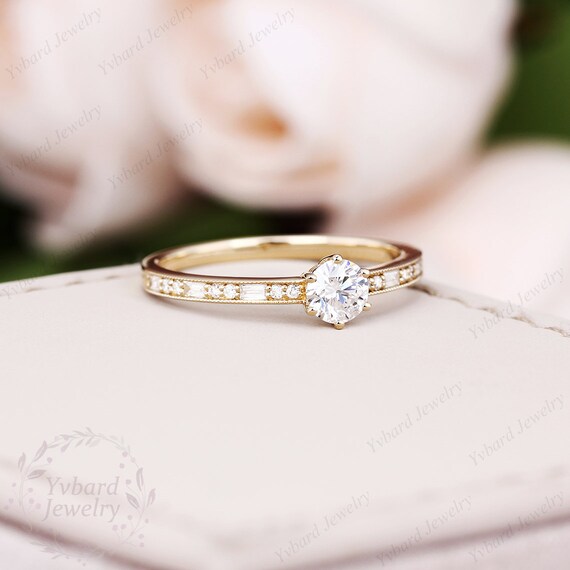 Engagement rings with 2024 multiple small diamonds