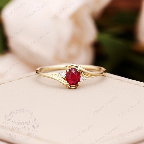 14K White Gold Diamond And Oval Ruby Twist Band Ring 14K White Gold Diamond And Oval Ruby Twist Band Ring