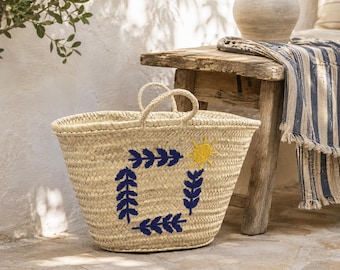 Handwoven Moroccan Palm Leaf Basket with Blue Leaf & Sun Embroidery