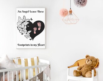 May include: A rectangular wall print featuring a black heart shape, a cluster of black and white butterflies on the left, and two pink baby footprints inside the heart. The text reads An Angel Leave These at the top and Footprints in my Heart below.