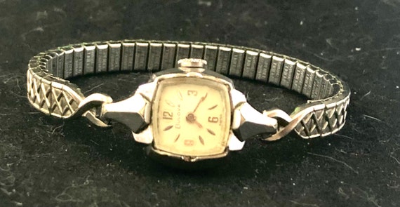 Bulova Women's 96P155 Diamond Accent Stainless Steel Bangle Bracelet Watch  : Amazon.in: Fashion
