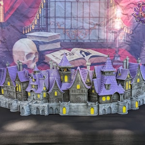 May include: A purple and gray miniature castle with a stone wall and a tower. The castle is made of plastic and is a tabletop game accessory.