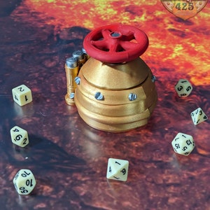 May include: A gold-colored metal steampunk-style valve with a red handle, surrounded by six white dice with black numbers on a red and brown surface. The text "Mythic Merchant 425" is visible in the upper right corner of the image.