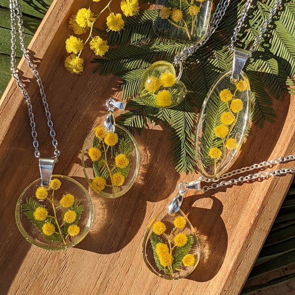 Necklace with pendant in real yellow mimosa flowers