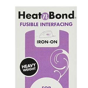 May include: A purple and white package of Heat n Bond fusible interfacing for jackets and waistbands. It is heavy weight, sewable, machine washable, and made of a non-woven poly blend. The package is 20 inches by 1 yard (50.8 cm by 0.91 m) and made in the USA.