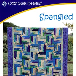 May include: A quilt pattern titled "Spangled" designed by Georgette Dell'Orco. The pattern is for a quilt made with 2 1/2 inch strips and includes sizes for a wall hanging, throw, twin, queen, and king.