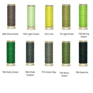 May include: Ten spools of Gutermann sewing thread in shades of green, from olive to spring green. Each spool is labelled with a colour number and name. The thread is 100m to 110m in length.