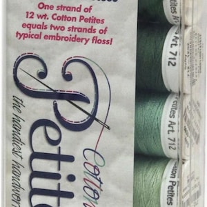 May include: A clear plastic package containing spools of green embroidery thread. The package features text that reads "Petites Cotton" and "Easier, Faster and More Fun than Floss." Each spool contains 50 yards of 100% cotton thread.