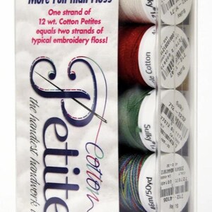 May include: A clear plastic pack of Sulky 12 wt. Cotton Petites embroidery thread spools. The pack contains various colours, including white, red, green, and blue. The packaging text states "Easier, Faster and More Fun than Floss."