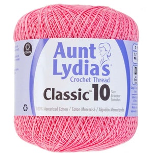 May include: A pink ball of Aunt Lydia's Classic 10 crochet thread. The label reads "Aunt Lydia's Crochet Thread" and "Classic 10". It also states that the thread is 100% mercerized cotton.