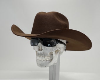 Dark Chocolate felt Cowboy hat soft felt on a hard shell, with an elastic sweat bandana for a comfort fit. A best seller Rain Cover Included