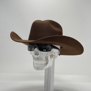 Dark Chocolate felt Cowboy hat soft felt on a hard shell, with an elastic sweat bandana for a comfort fit. A best seller Rain Cover Included