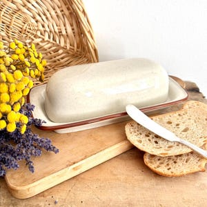 Rectangular speckled beige butter dish