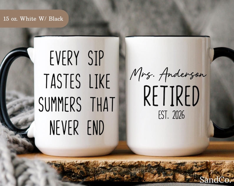 May include: Two white ceramic mugs with black handles and rims. One mug reads "EVERY SIP TASTES LIKE SUMMERS THAT NEVER END" in black text. The other mug says "Mrs. Anderson RETIRED EST. 2026". Each mug is 15 oz.