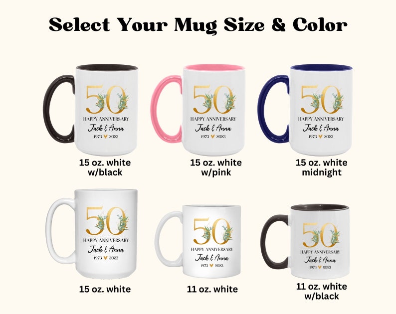 May include: Six white mugs with different colored rims and handles. The mugs feature a gold 50th anniversary design with green leaves and the text "Happy Anniversary Jack & Anna 1973 &hearts; 2023". The mugs are available in 11 oz and 15 oz sizes.