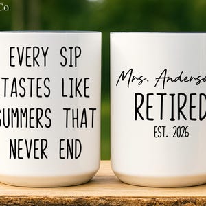 May include: White ceramic mug with black handle and rim. One side reads "EVERY SIP TASTES LIKE SUMMERS THAT NEVER END" in black text. The other side says "Mrs. Anderson RETIRED EST. 2026" in black text. The mug is on a wooden surface.