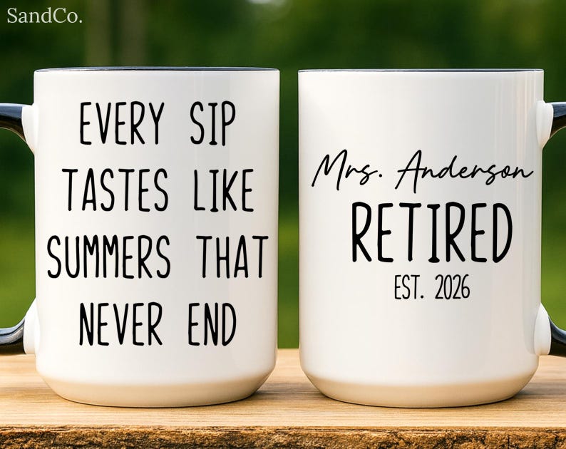 May include: White ceramic mug with black handle and rim. One side reads "EVERY SIP TASTES LIKE SUMMERS THAT NEVER END" in black text. The other side says "Mrs. Anderson RETIRED EST. 2026" in black text. The mug is on a wooden surface.