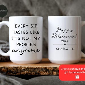 May include: Two white ceramic mugs with black text. One mug reads "EVERY SIP TASTES LIKE IT'S NOT MY PROBLEM anymore." The other says "Happy Retirement 2024" with a name below. Each mug is 15 oz.