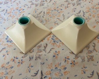 A pair of Low Lying Matte Finish Ivory and Turquoise Catalina Pottery Taper Candle Holders