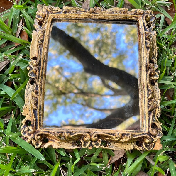 Vintage, small gold framed mirror