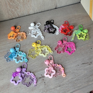Star keychains Bell gummy bear Charm | Colorful Stars, Double Star, Chain Link