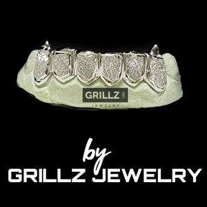Grillz with FREE custom fangs, solid frames and diamond dust (Silver 925 - 14K Gold), fast turnaround, 2 days shipping by Grillz jewelry