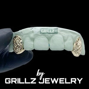 Custom fangs vampire canines FREE diamond cuts, no fit no money, FREE mold kits, FREE priority shipping, fast process by Grillz jewelry