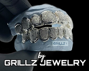 Grillz near me, stylish look in white gold, silver with FREE diamond dust, solid frames, FAST process, FREE shipping, extra mold kits