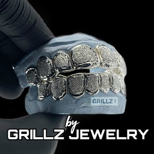 Grillz near me, stylish look in white gold, silver with FREE diamond dust, solid frames, FAST process, FREE shipping, extra mold kits