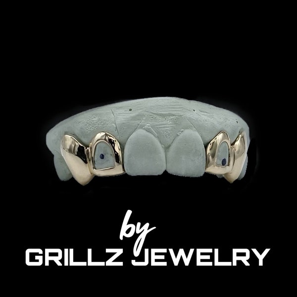 Trendy custom grillz with open face and middle two skipped with small fangs / canines added, done fast, express delivered by Grillz jewelry