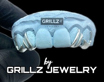 Stilvolle Doppelflügel und gebogene Zähne mit Backbar-Verbindung, Mitte zwei Zähne übersprungen, Custom Grillz Shiny Fit weiße Farbe, Free Mould Kits
