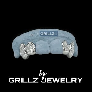Elevate your look with high-quality gold grillz, designed just for you.