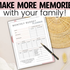 May include: A printable monthly budget planner with a pink and blue design. The planner includes sections for savings, income, bills, and other expenses. The text "MAKE MORE MEMORIES with your family!" is at the top of the page.