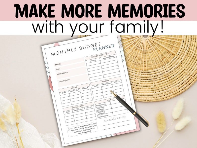 May include: A printable monthly budget planner with a pink and blue design. The planner includes sections for savings, income, bills, and other expenses. The text "MAKE MORE MEMORIES with your family!" is at the top of the page.