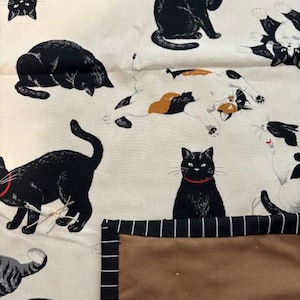 Multi Neutral Cats on Cream Quilt
