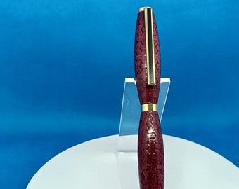 Lilafarbener Drehstift mit Herzgravur