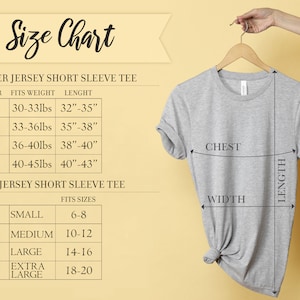 May include: Size chart for toddler and youth short sleeve t-shirts. The chart shows sizes, corresponding weight ranges, and length measurements in inches. The chart also shows youth sizes with corresponding fits.
