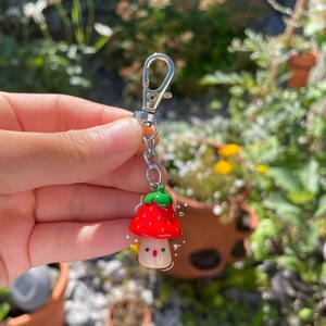 Handmade polymer clay strawberry mushroom keychain!