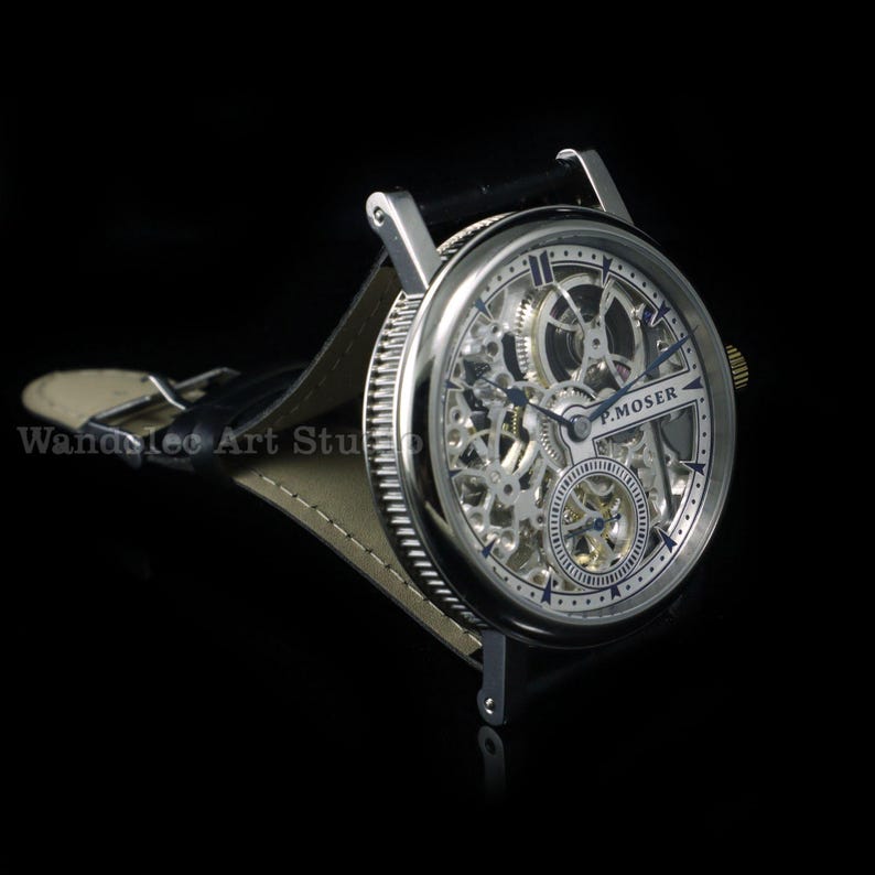 May include: A silver-toned skeleton watch with a black leather band. The watch face features intricate gears and the text "H. MOSER". The watch is set against a black background.